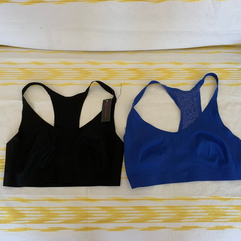 2 bralettes size medium.  Laser cut fabric. Never worn. 1 has tags.